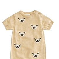 Beige baby romper with embroidered dog faces on a white background
