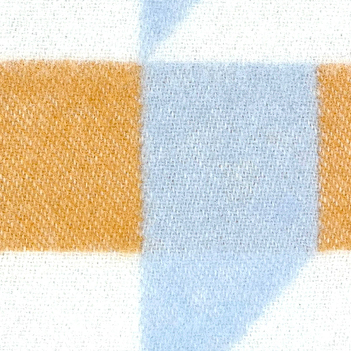 A close-up of a woven fabric pattern featuring a white base with a light blue geometric triangle and a mustard yellow horizontal stripe.