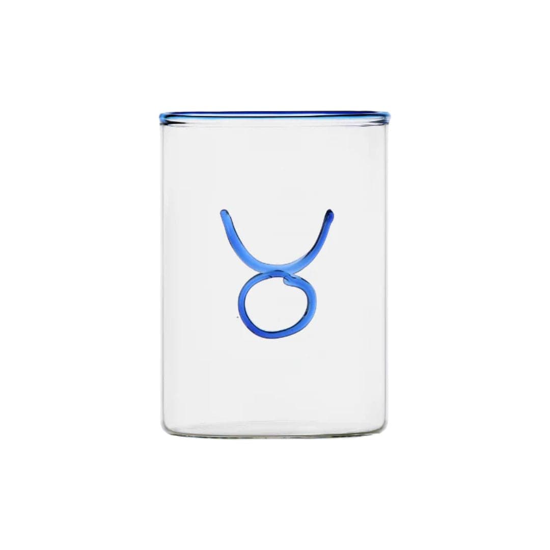 clear glass tumbler with blue rim and blue taurus symbol modern nomad home decor store denver colorado CO