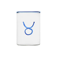 clear glass tumbler with blue rim and blue taurus symbol modern nomad home decor store denver colorado CO
