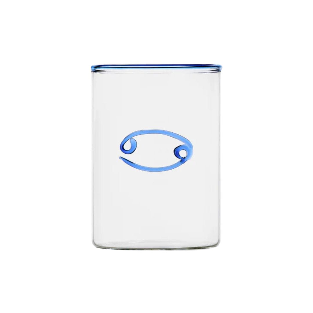 clear glass tumbler with blue rim and blue cancer symbol modern nomad home decor store denver colorado CO