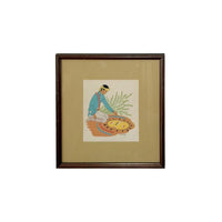 Framed artwork of a person with a plant on a beige background