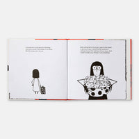 Open book with black and white illustrations of a person and a shopping cart on a white background