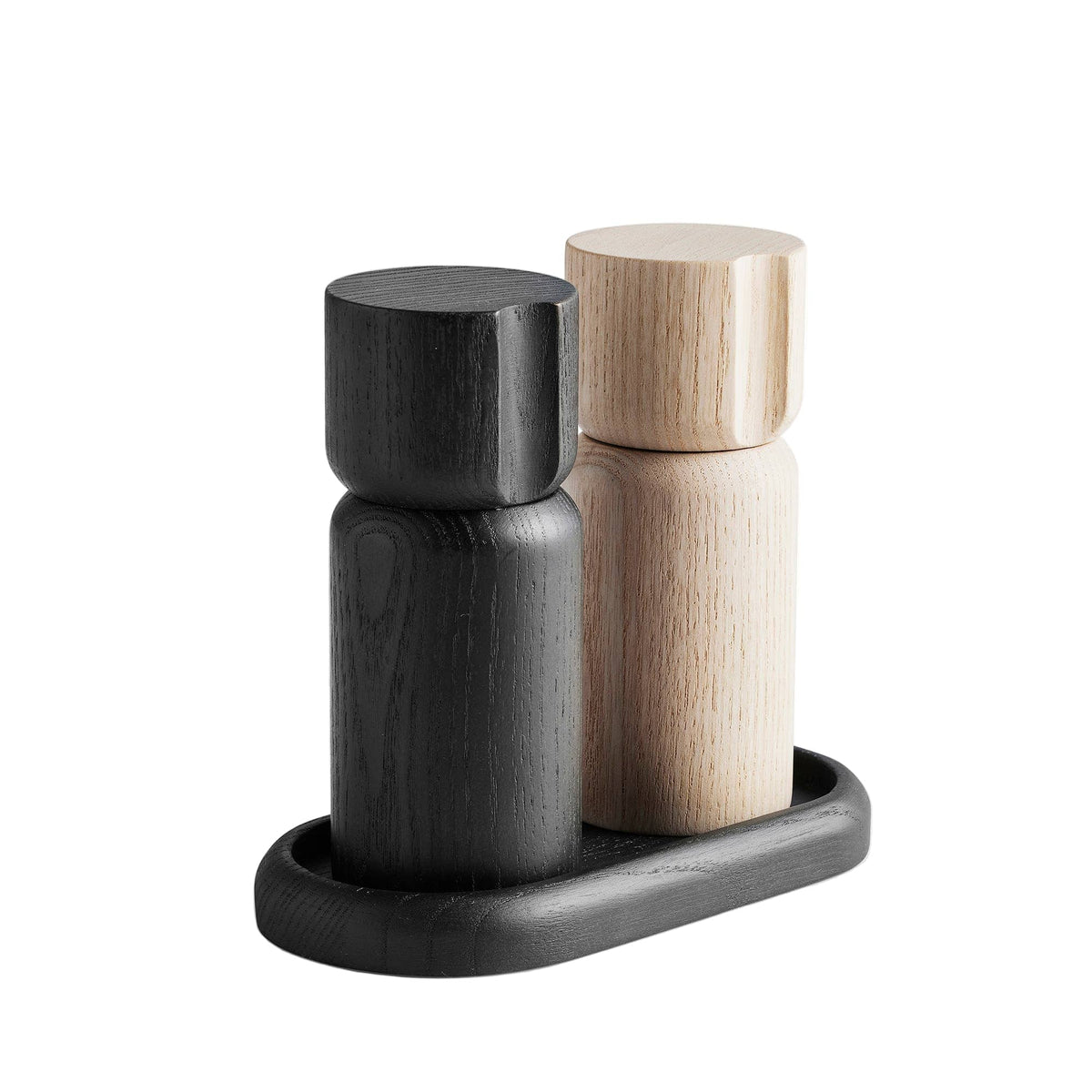 Salt and pepper shakers on a tray.