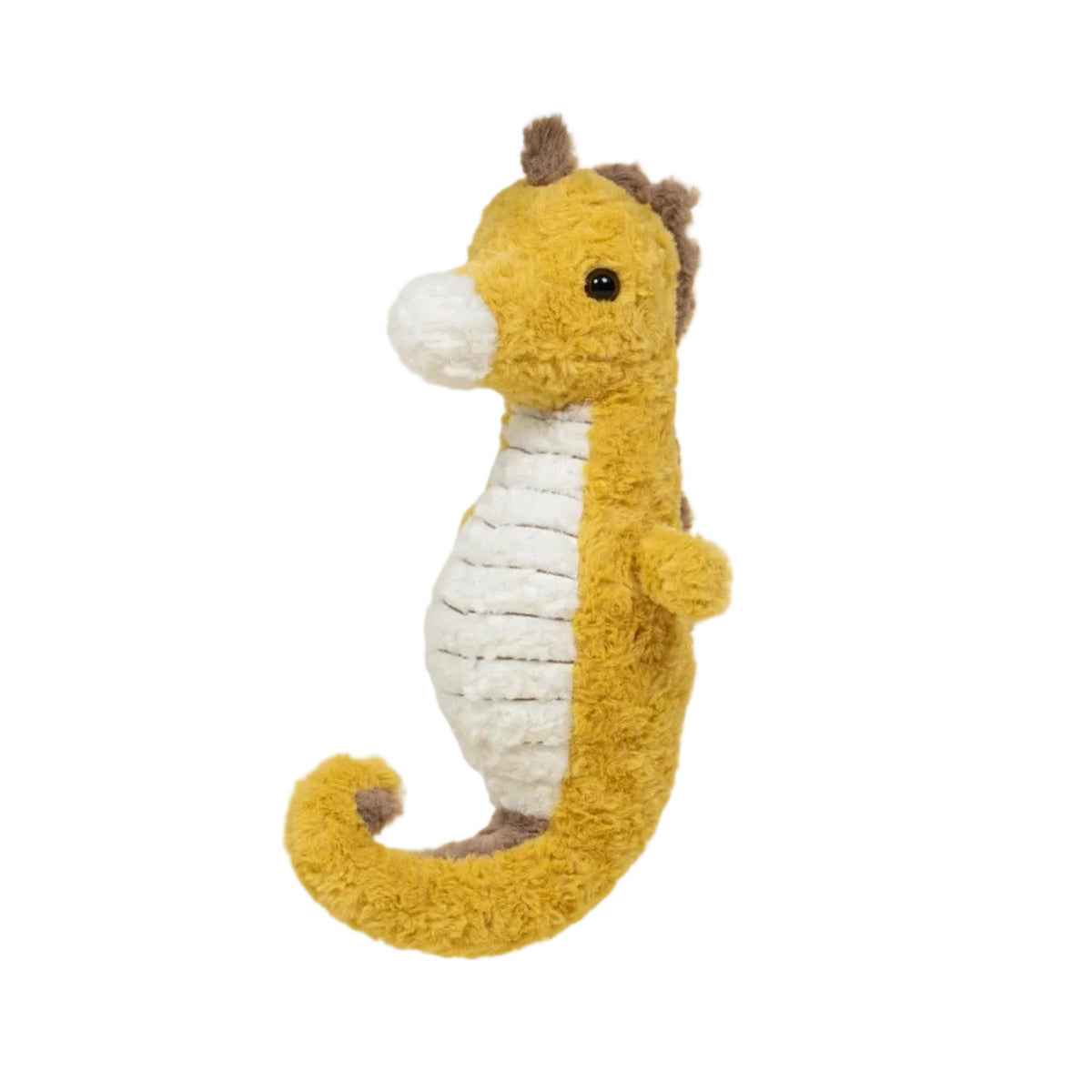 Plush toy seahorse on a beige background