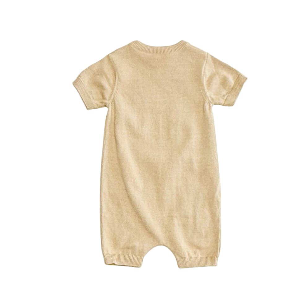 Beige baby romper on a white background