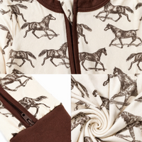 Children's outfit with horse pattern and brown trim, shown in close-up and swirled views.