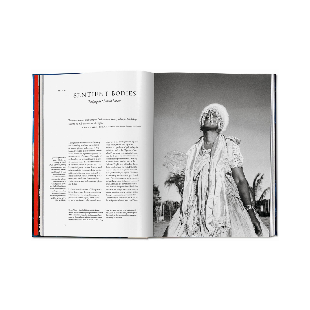 An open book spread showing a black-and-white photograph on the right page and text on the left page, photographed against a plain white background.